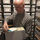 Each element of a game is tagged with a QR code and stored separately in acid-free, specially-designed envelopes and boxes.